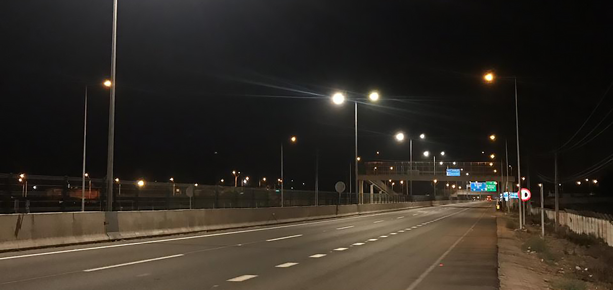 Modern city with decorative street light poles